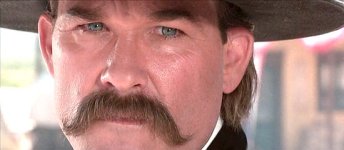 Kurt-Russell-as-Wyatt-Earp-sensing-troubles-about-to-start-at-the-OK-Corral-in-Tombstone-1993.jpg