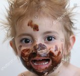stock-photo-baby-with-face-covered-in-chocolate-31572949.jpg