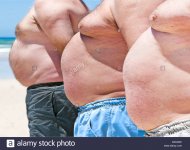 close-up-of-three-obese-fat-men-of-the-beach-D044WK.jpg